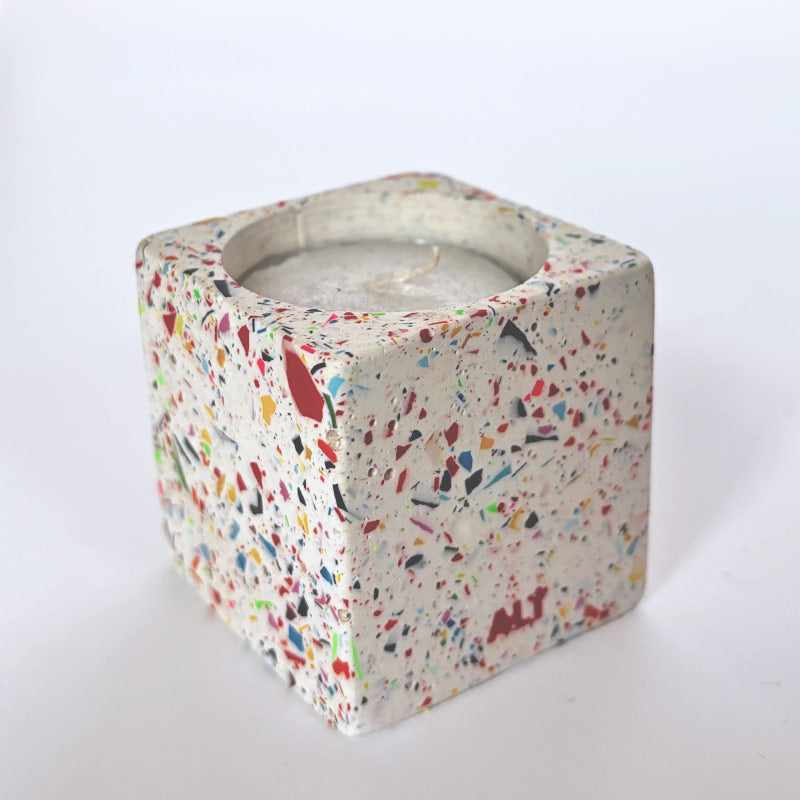 Colourful rainbow confetti terrazzo rectangular tea light candle holder on a white background