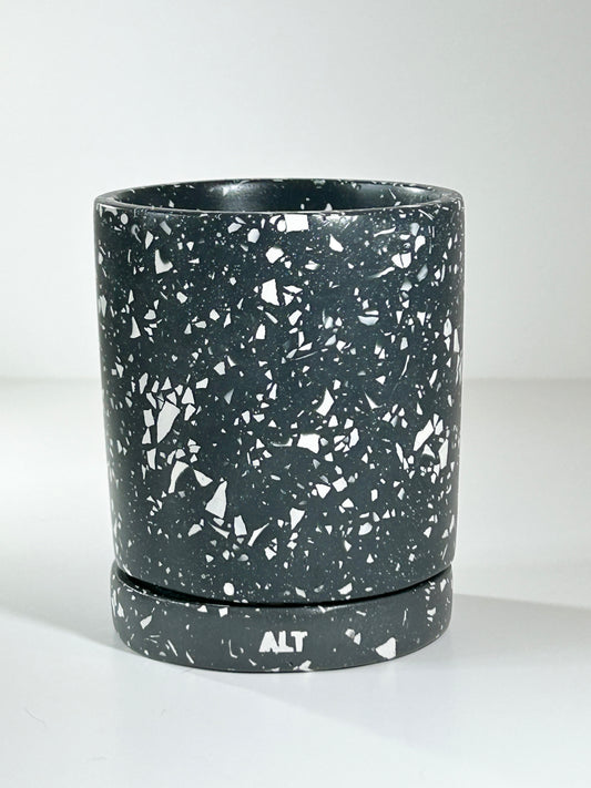 Navy with white terrazzo planter with 'ALT' branding on a white  background