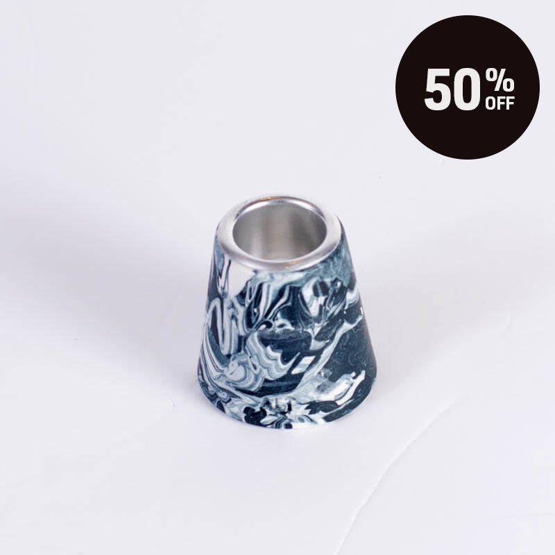 A marbled Navy and white small taper candle holderwith a silver metal inner rim, shown on a white background with a black '50% OFF' promotional badge in the top right corner.