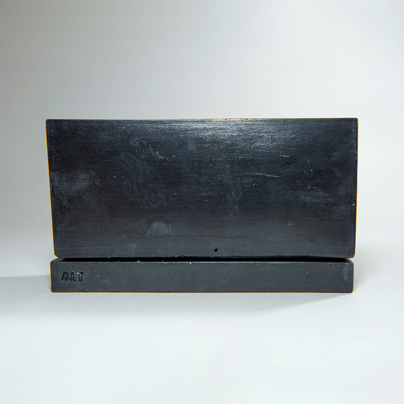 Rectangular black planter with drainage holes and a water tray box with 'ALT' branding on a white background