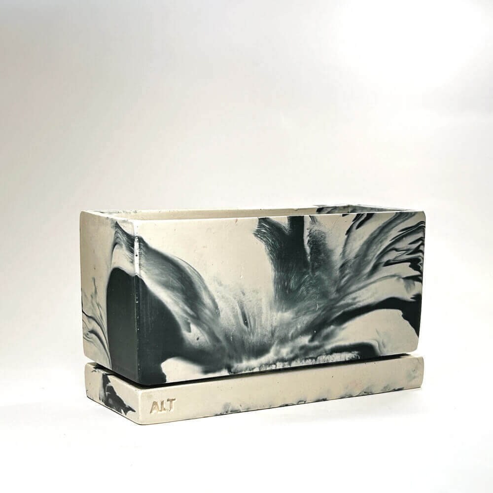 Marble-patterned rectangular navy plant pot with drainage holes and a water tray ALT' branding on a white background