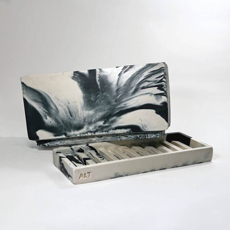 Marble-patterned rectangular navy plant pot with drainage holes and a water tray  on a white background