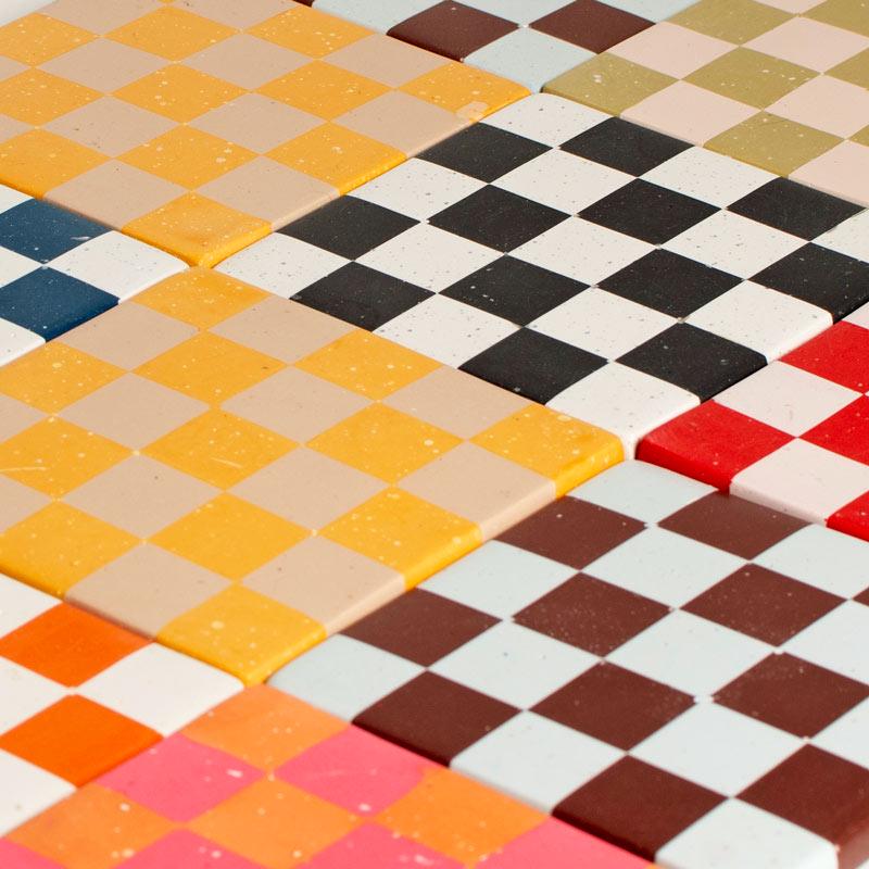 Colourful checkered pattern of square coasters