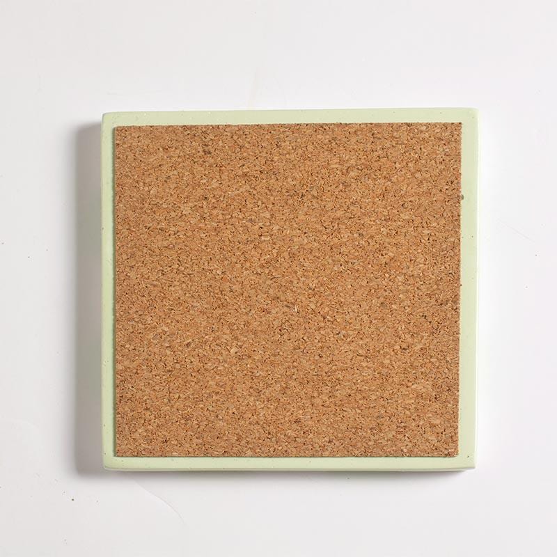 Square coaster with cork a white background