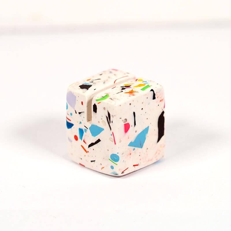 Colorful rainbow terrazzo photo holder on a white background