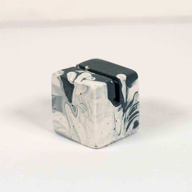 Marbled patterned navy and white small photo holder on a white background