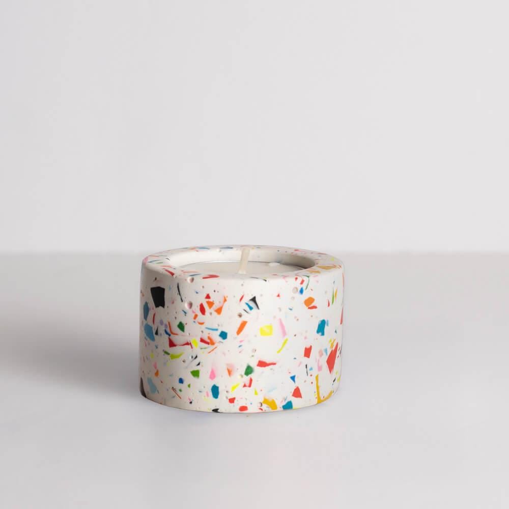 Rainbow terrazzo candle holder on a white background