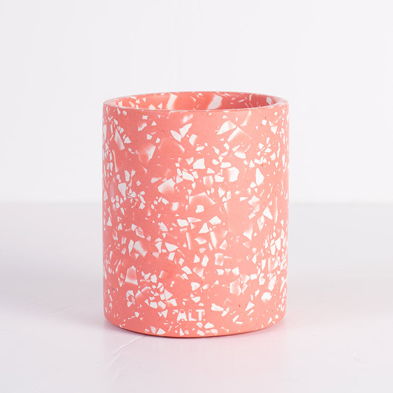 Pink terrazzo pen pot on a light grey background