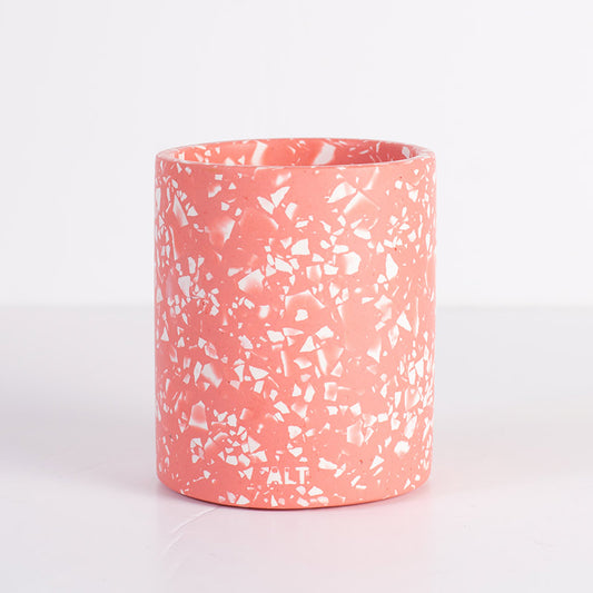 Pink terrazzo pen pot on a light grey background