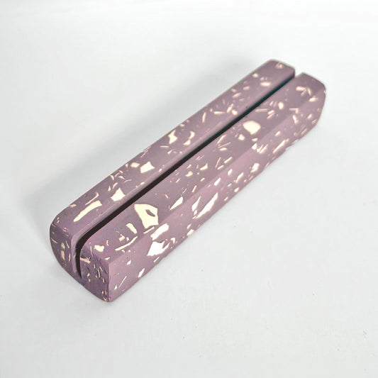 Lilac rectangular photo holder with white terrazzo on a white background