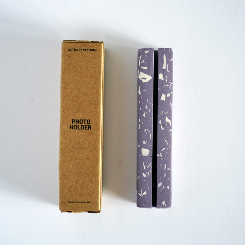 Lilac rectangular photo holder with white terrazzo and brown box with 'ALT Hackney' branding on a white background