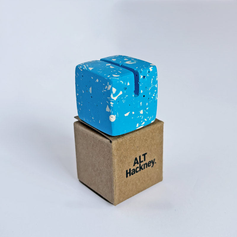 Light Blue terrazzo square photo holder on an eco brown box with 'ALT Hackney' branding