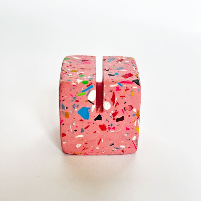 Pink Photo Holder with colourful rainbow terrazzo on a white background