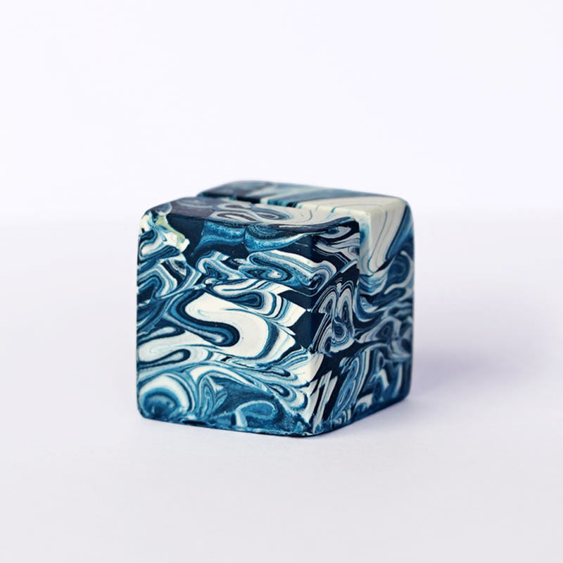 Marble patterned navy and white small photo holder on a white background