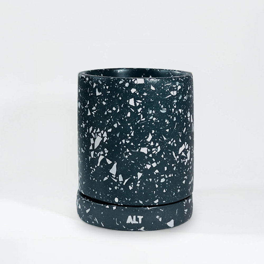 Navy with white terrazzo planter with 'ALT' branding on a white  background
