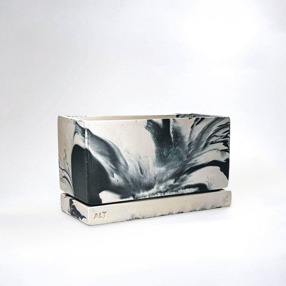 Marble-patterned rectangular navy plant pot with drainage holes and a water tray ALT' branding on a white background