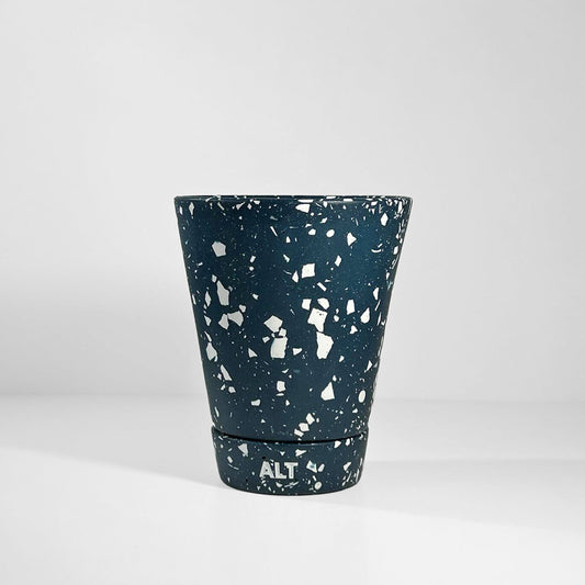 Navy terrazzo planter pot with 'ALT' branding on a light grey background