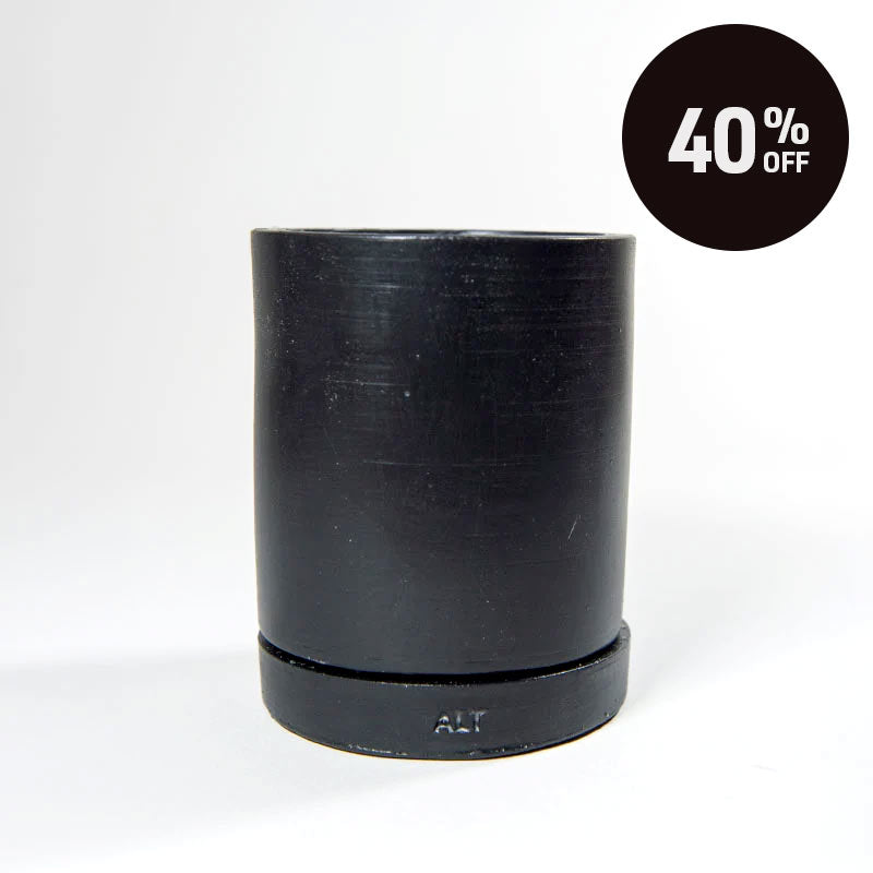 A black cylindrical plant pot with a separate saucer and a drainage hole, shown on a white background with a black circular '40% OFF' promotional badge in the top right corner.