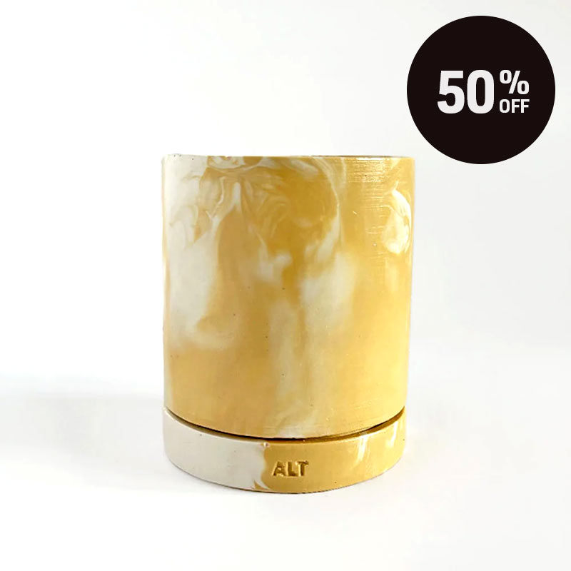 A marbled beige and white plant pot with drainage hole and a water tray with 'ALT' branding on a white background with a black '50% OFF' promotional badge in the upper right.
