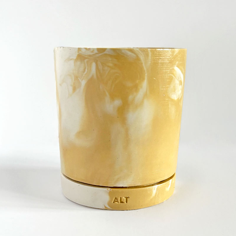 Marbled beige and white plant pot with drainage hole and a water tray with 'ALT' branding on a white background
