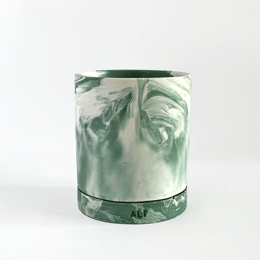 Moss Green and white marbled plant pot with drainage and a water tray with 'ALP' branding on a light gray background
