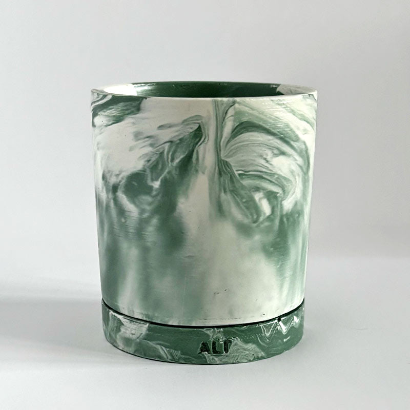 Moss Green and white marbled plant pot with drainage and a water tray with 'ALP' branding on a light gray background