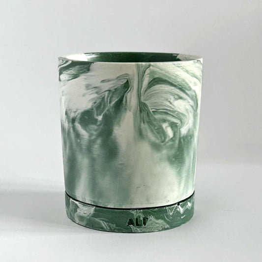 Moss Green and white marbled plant pot with drainage and a water tray with 'ALP' branding on a light gray background