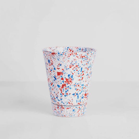 Red and Blue terrazzo plant pot with drainage holes and a water tray 