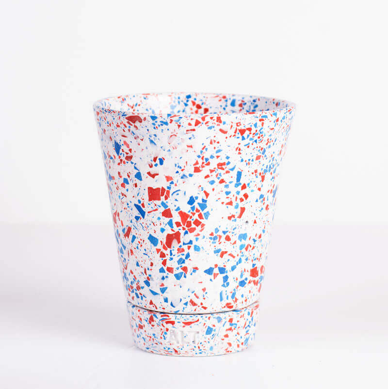 Red and Blue terrazzo plant pot with drainage holes and a water tray 