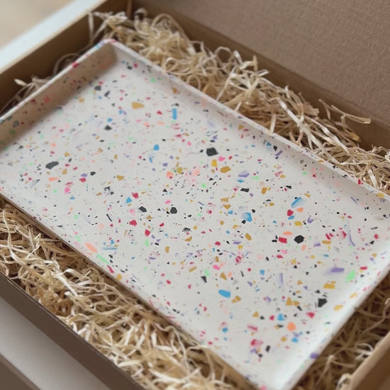 Rectangular tray with an eco brown packaging box with ALT Hackney logo