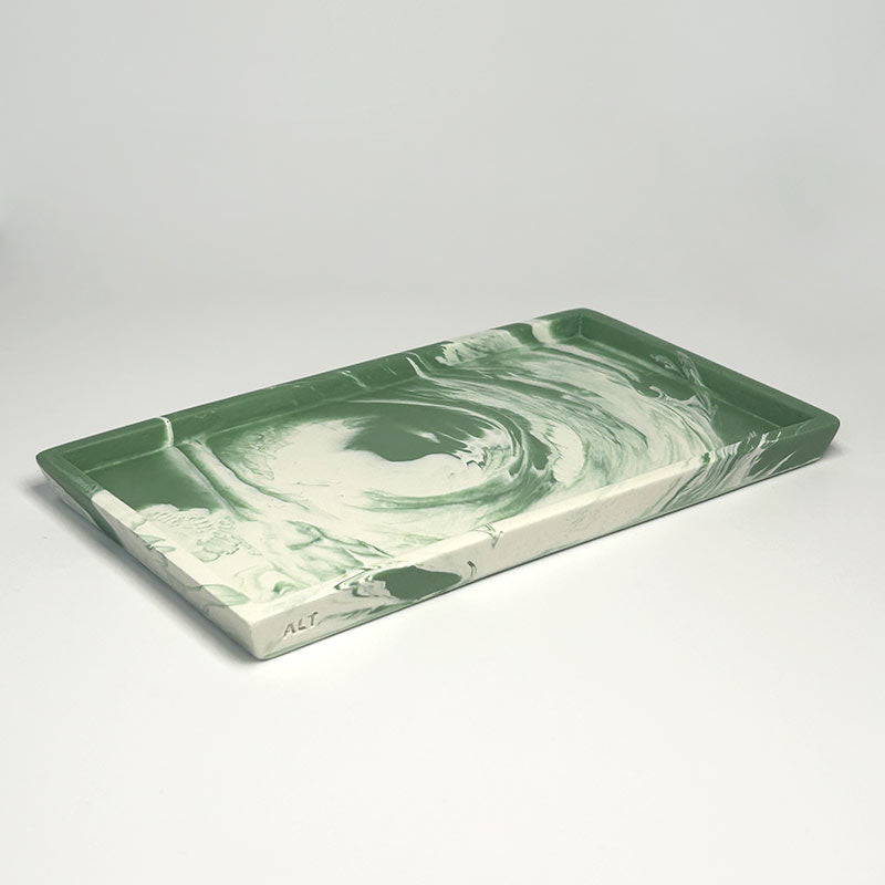 Small Rectangular moss green and white marbled tray on a light gray background