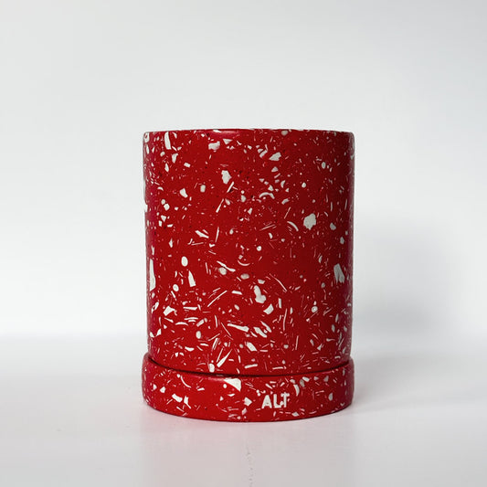 Red with white terrazzo planter with 'ALT' branding on a white  background