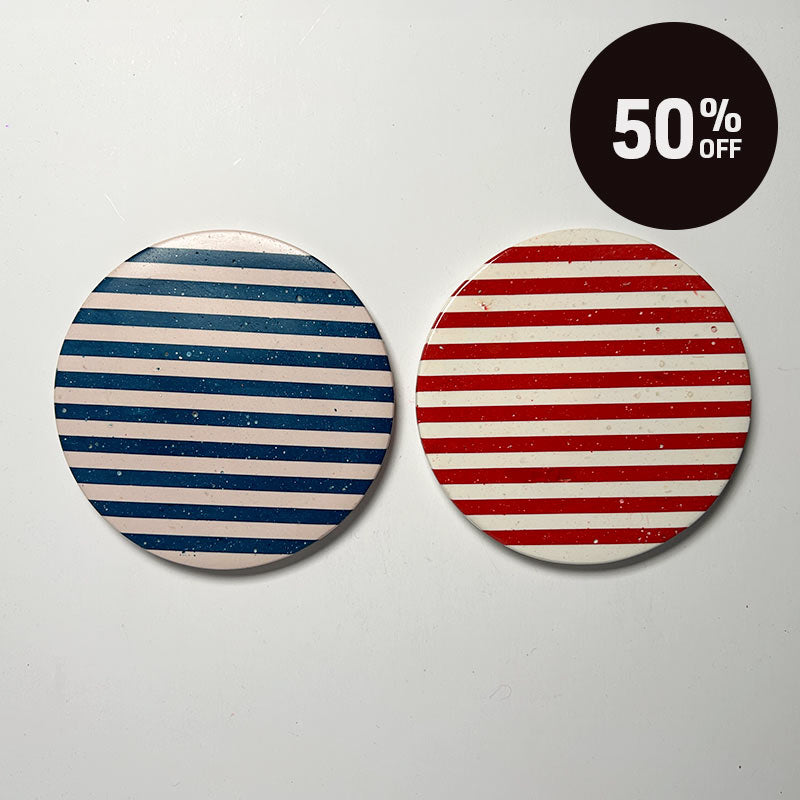 Two stipe patterned round coasters side by side on a white background with a 50% off promotion badge on top right corner