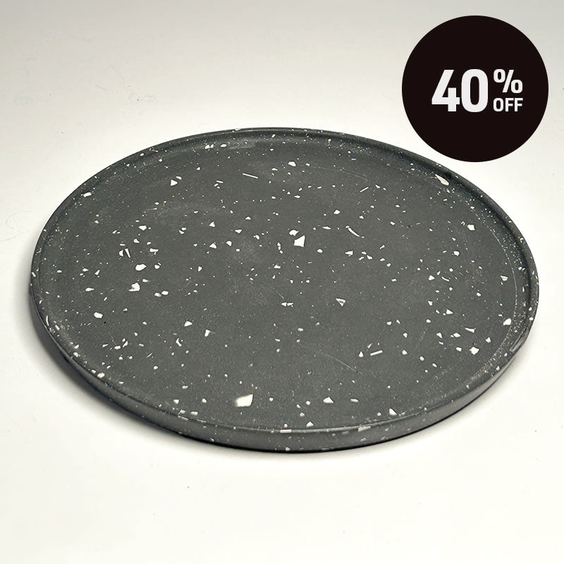A round black tray with a white terrazzo speckled pattern, shown on a light gray background with a black circular '40% OFF' promotional badge in the top right corner.