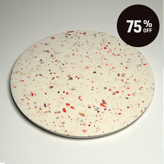 A round terrazzo tray with a white base and red and pink chips, shown on a white background with a black '75% OFF' promotional badge in the top right corner.