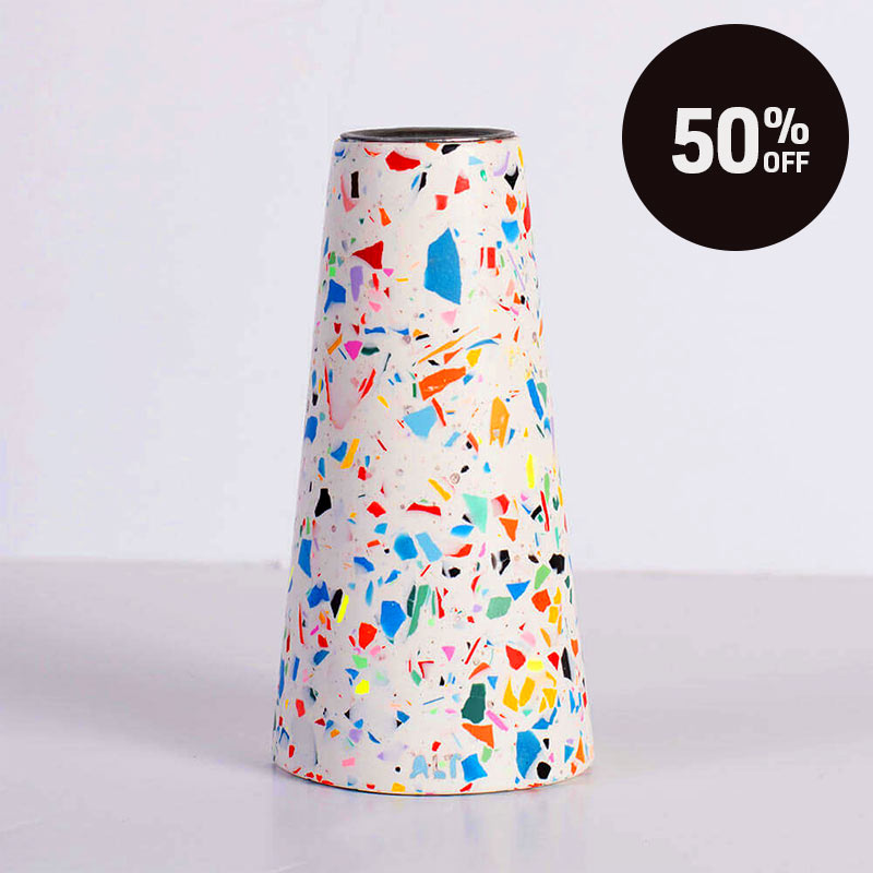 A white and rainbow terrazzo patterned taper candle holder with a silver-toned top, shown on a white background with a black 'Up to 50% OFF' promotional badge in the top right corner.