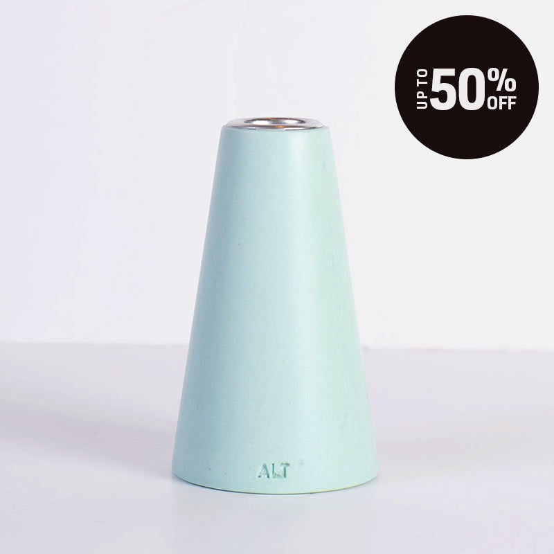 A mint green taper candle holder with a silver-toned top, shown on a white background with a black 'Up to 50% OFF' promotional badge in the top right corner.