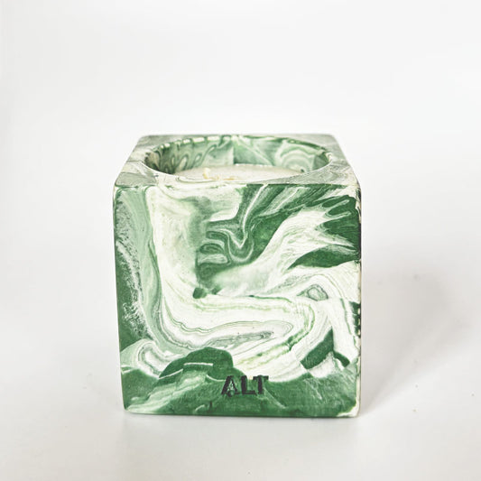 Green and white marble patterned candle holder with 'ALT' branding on a white background