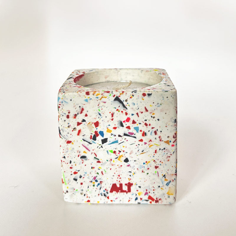 Colourful rainbow confetti terrazzo rectangular tea light candle holder on a white background