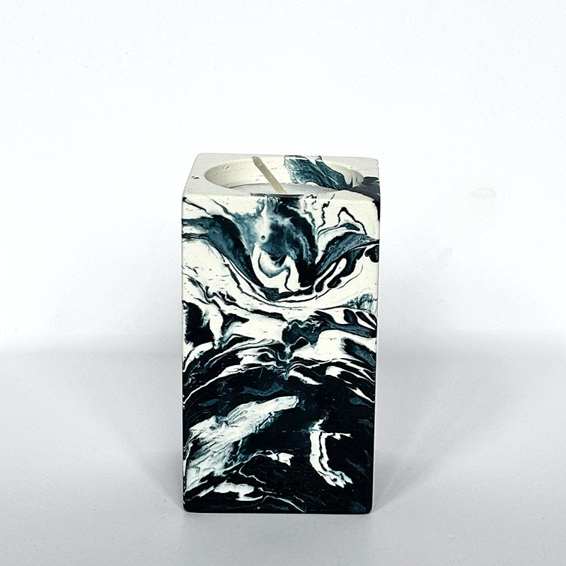 Navy and white marble patterned tea light candle holder with 'ALT' branding on a white background