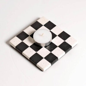 Handcrafted black and white checkered patterned square coaster with a tea light candle, Jesmonite trinket vanity key tray