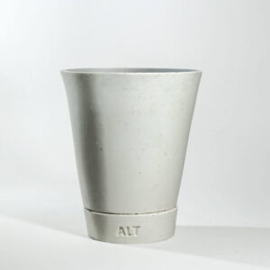 White angular plant pot planter with drainage holes and a saucer tray