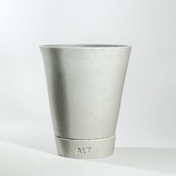 White angular plant pot planter with drainage holes and a saucer tray