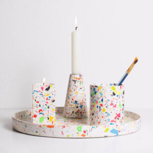 Large rainbow terrazzo round tray, rainbow terrazzo squared tealight holder, tall rainbow terrazzo tapered candle holder and rainbow terrazzo penpots